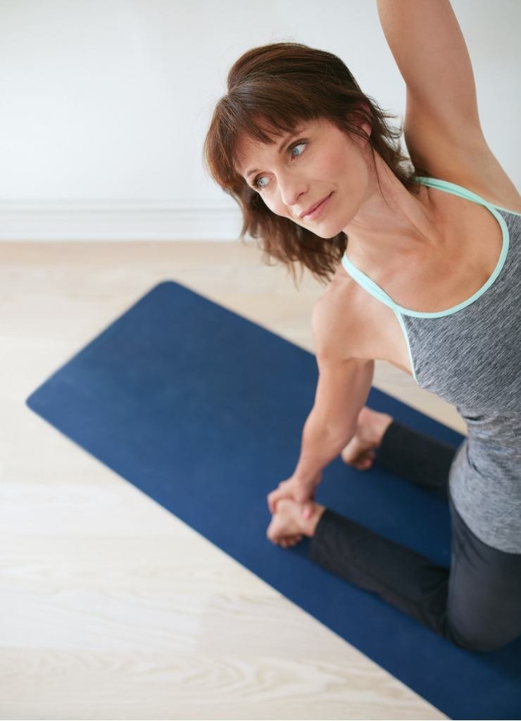 fitness-woman-doing-yoga-ustrasana-pose-picture-id486687536